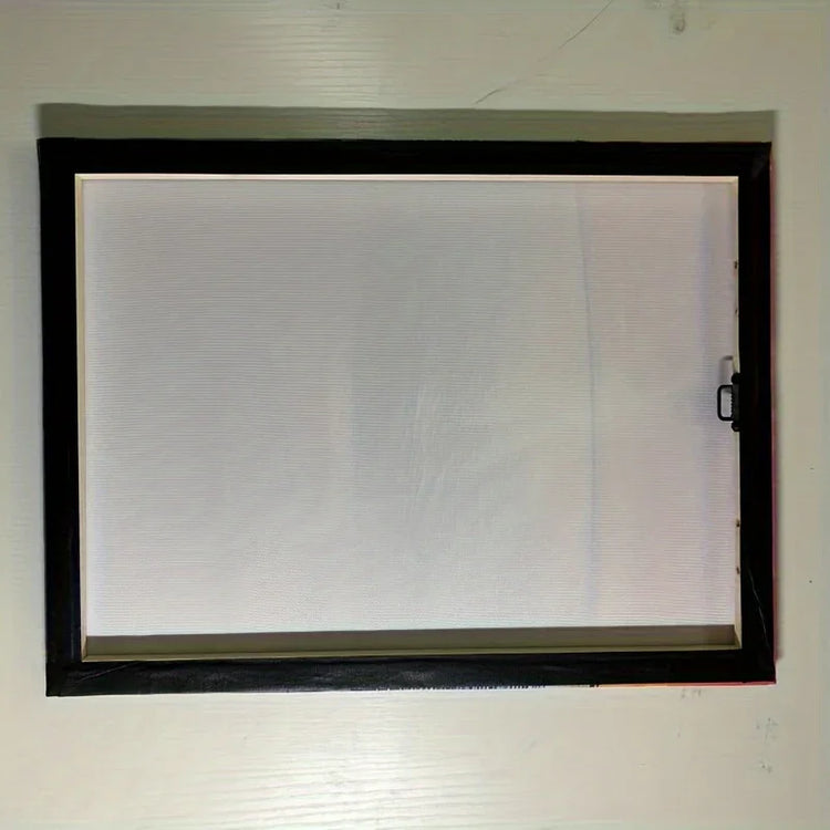 Stylish black-framed window screen with sleek handle, perfect for modern home décor.