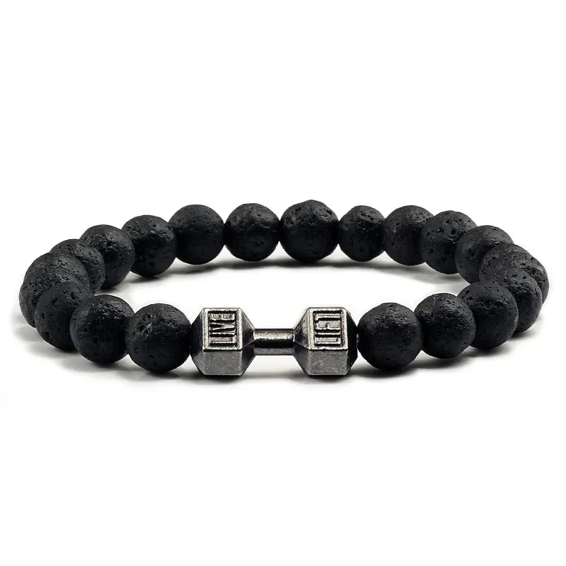Unique black lava stone bracelet with silver dumbbell charm, perfect for bold personal style