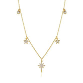 Dazzling gold star charm necklace with shimmering crystals, perfect for a unique statement look.