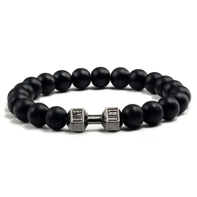 Matte black beaded bracelet with a unique silver dumbbell charm, perfect for bold style