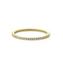 Elegant gold eternity band with sparkling pavé diamonds, perfect for a unique jewelry statement.