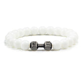 Striking white beaded bracelet with antique silver dumbbell charm, perfect for unique style lovers