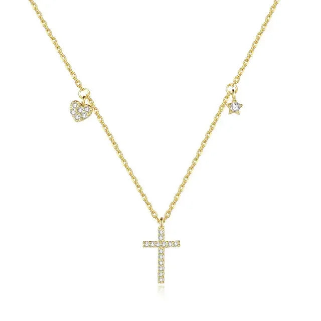 Sparkling gold necklace with cross, heart, and star charms, expressing unique elegance.