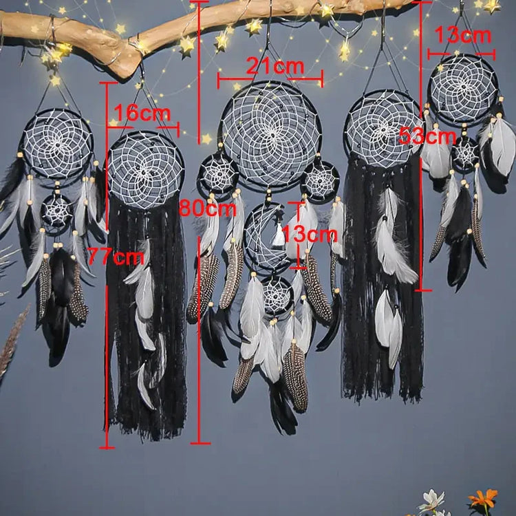 Eye-catching black and white dreamcatchers with feathers, unique boho wall décor, measurements shown