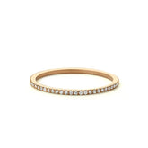 Elegant rose gold diamond eternity band with sparkling pavé stones, perfect for unique style