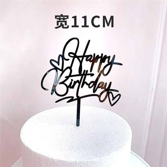 Chic black acrylic Happy Birthday cake topper with heart accents, perfect for unique birthday décor