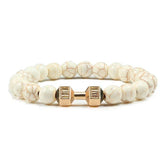 Unique white marble bead bracelet with gold dumbbell charm, eye-catching modern jewelry