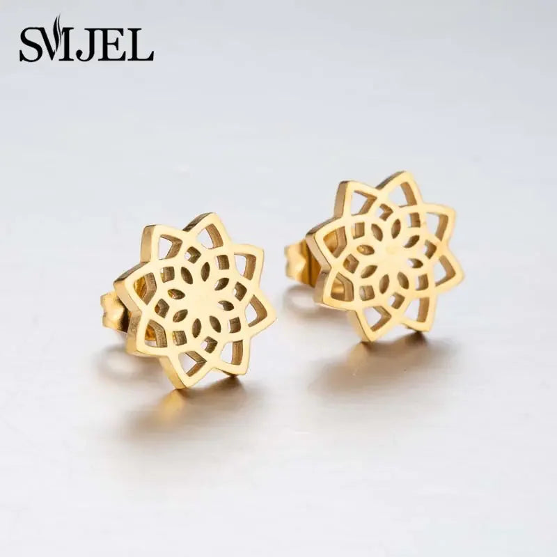 Intricately cut gold flower stud earrings, perfect for expressing unique jewelry style.