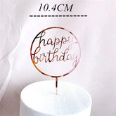 Stylish rose gold happy birthday cake topper in a unique circular design, 10.4cm tall.