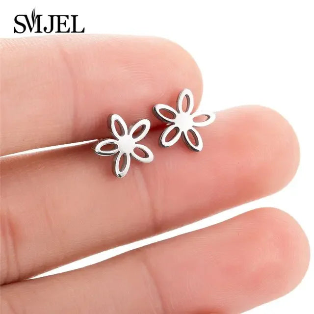 Delicate silver flower stud earrings, uniquely shaped for a standout, stylish look