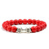 Bold red beaded bracelet with unique silver dumbbell charm, perfect for standout style