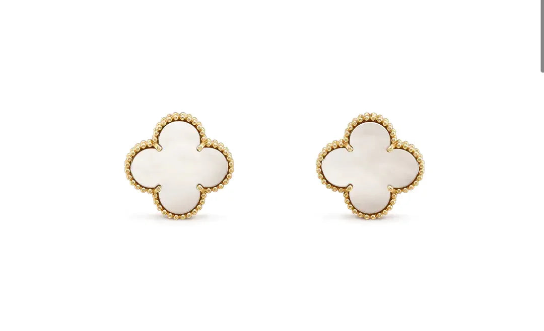 Elegant clover-shaped mother-of-pearl stud earrings with gold beaded trim, sparking curiosity.