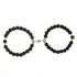 Unique black beaded bracelets with intricate silver accents, captivating modern jewelry design
