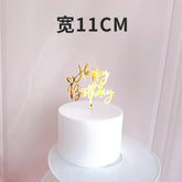 Chic gold Happy Birthday cake topper on white cake, perfect for unique party décor