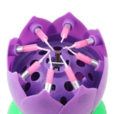 Purple lotus flower candle holder with pink candles, a unique decorative home accent.