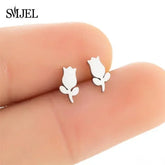 Delicate rose-shaped stud earrings, minimalist design, perfect for a unique, stylish look