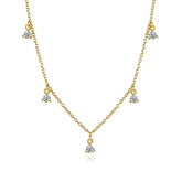 Elegant gold chain necklace with sparkling crystal charms, inviting unique style and curiosity.