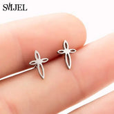 Sleek silver cross stud earrings with a unique cutout design, perfect for modern minimalist style.