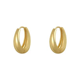Elegant gold hoop earrings with a bold, modern design—discover your unique jewelry style.