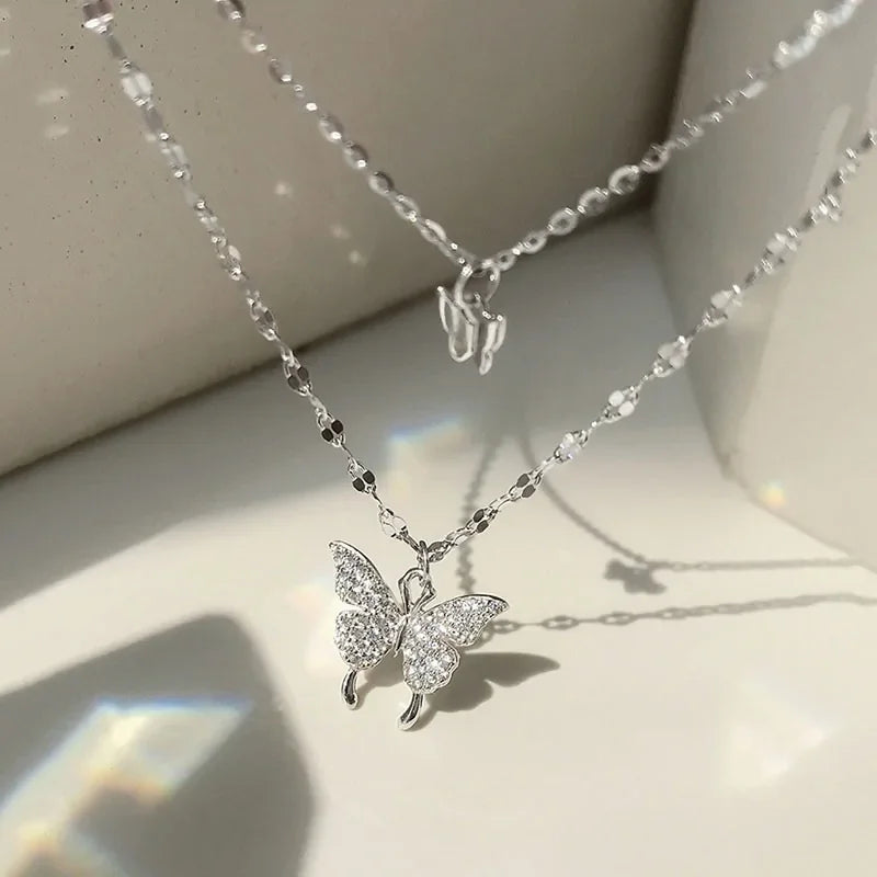 Sparkling butterfly pendant necklace gleams in sunlight, inviting your unique style curiosity.