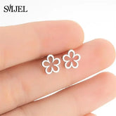 Dainty silver flower stud earrings, minimalist jewelry for a unique, stylish accent