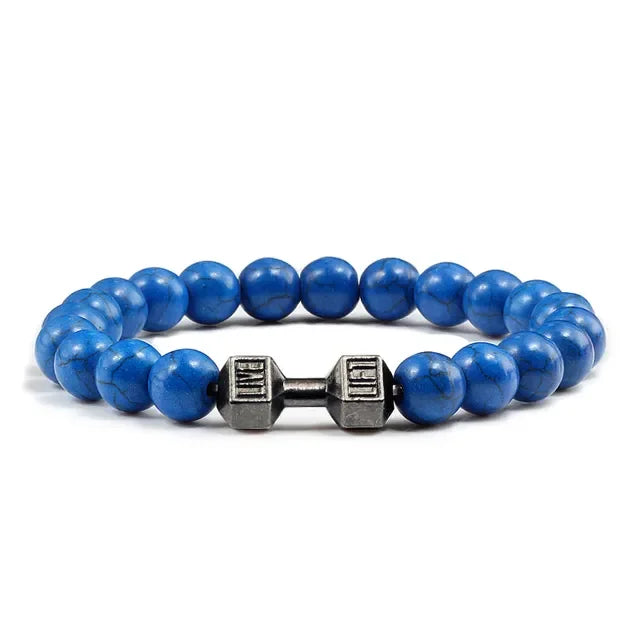 Vivid blue beaded bracelet with unique silver dumbbell charm, perfect for bold personal style.