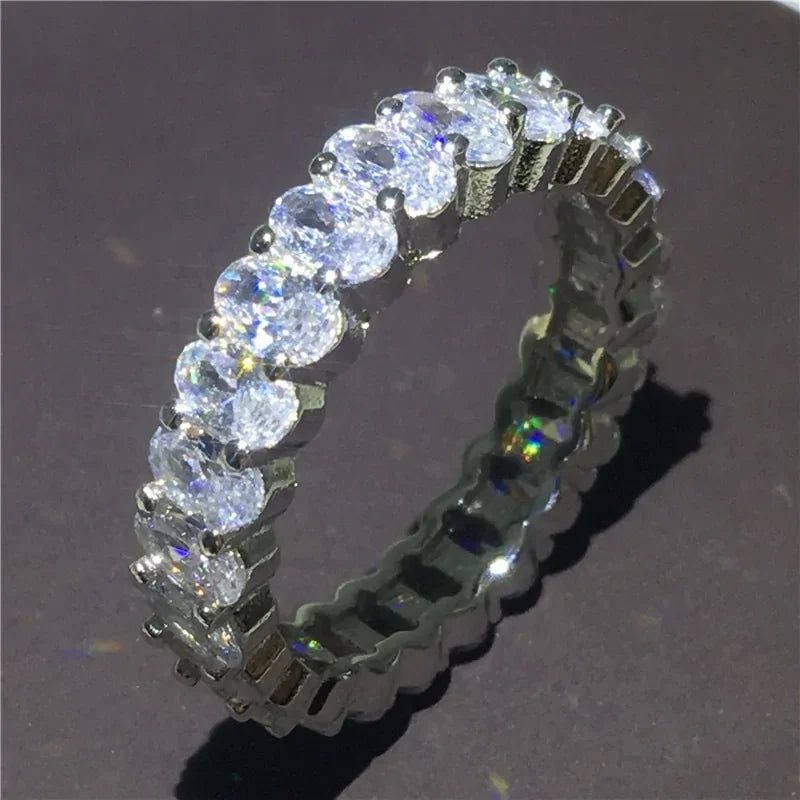 Sparkling eternity band with dazzling round-cut stones, radiant and uniquely eye-catching