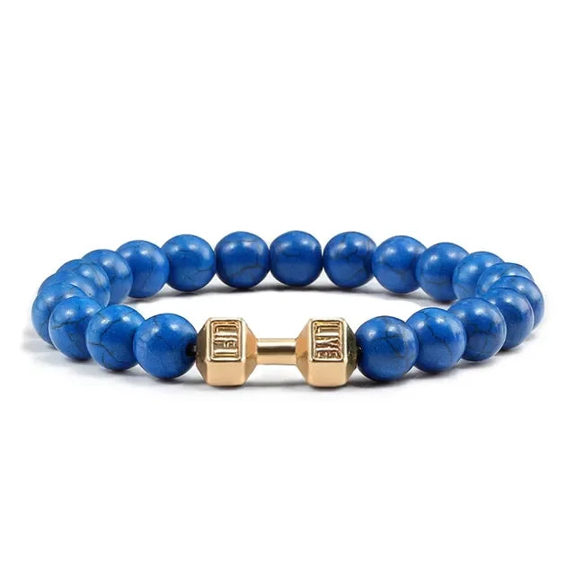 Eye-catching blue beaded bracelet with a unique gold dumbbell charm, perfect for bold style seekers.