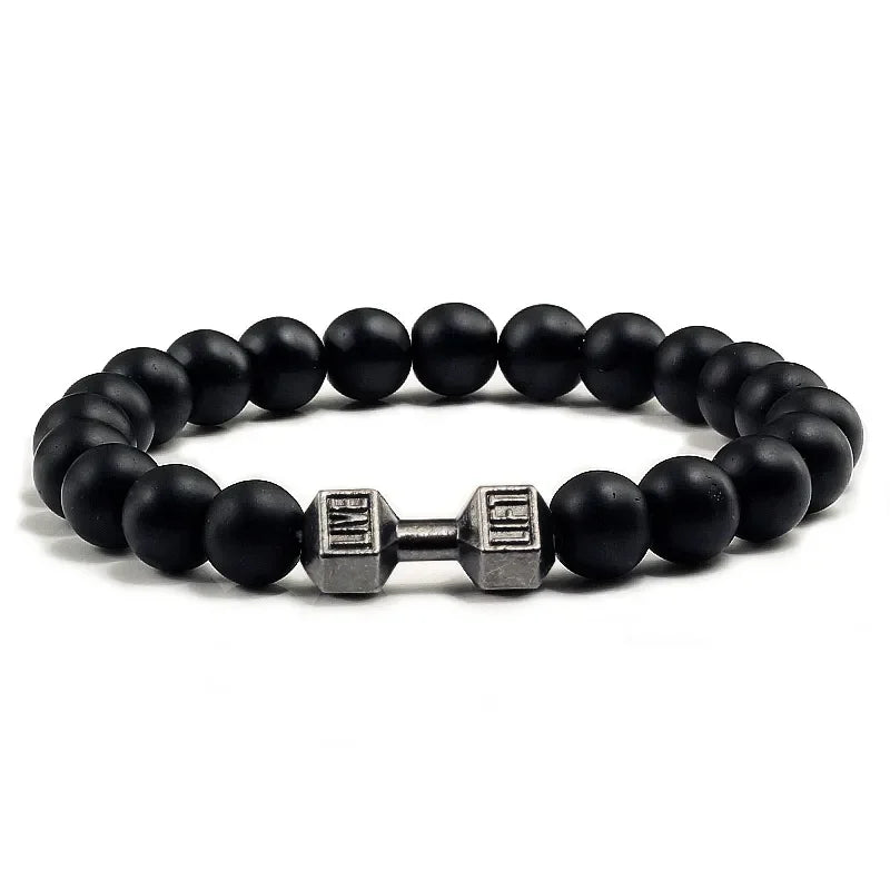 Matte black beaded bracelet with unique silver dumbbell charm, bold and stylish design.