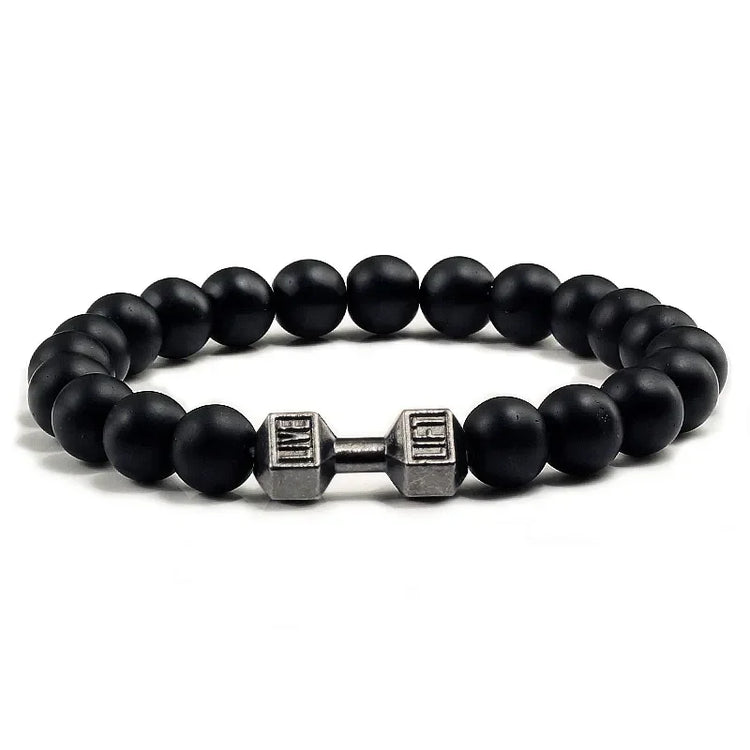 Matte black beaded bracelet with unique silver dumbbell charm, bold and stylish design.