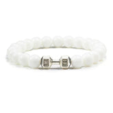Elegant white beaded bracelet with unique silver dumbbell charm for stylish, standout jewelry