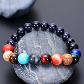 Vibrant multicolor gemstone beaded bracelet on smooth stone, unique jewelry for bold style