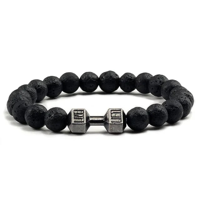 Distinctive black lava bead bracelet with a unique silver dumbbell charm, bold and stylish