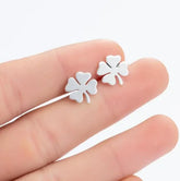 Chic four-leaf clover stud earrings, playful silver jewelry perfect for a unique standout style