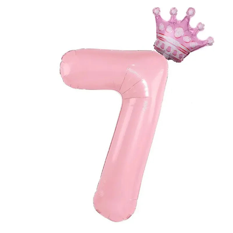 Charming pink number 7 balloon with a crown, perfect for unique birthday décor