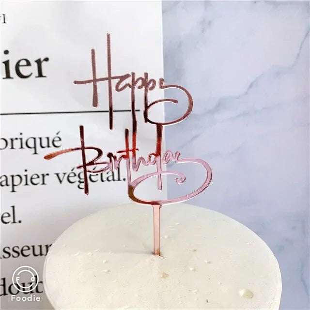 Elegant rose gold Happy Birthday cake topper adding charm to a minimalist white cake