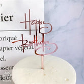 Elegant rose gold Happy Birthday cake topper adding charm to a minimalist white cake