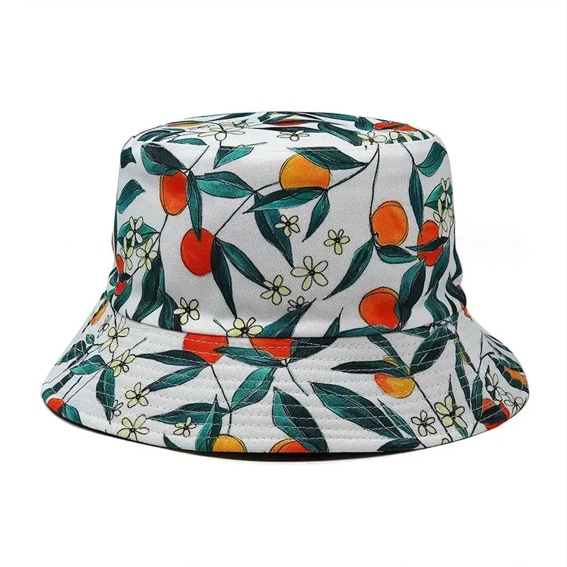 Bright floral and orange fruit pattern bucket hat, perfect for unique, stylish summer outfits.