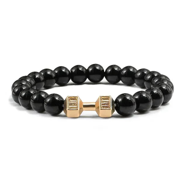Sleek black beaded bracelet with a unique gold dumbbell charm, perfect for stylish self-expression.