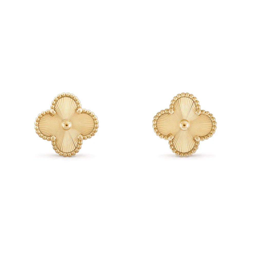 Elegant gold clover stud earrings with unique beaded edges, perfect for a chic, standout look.