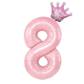 Shiny pink number 8 balloon with a playful crown, perfect for unique birthday décor