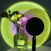 Curious yellow roses in glass vase with unique rainbow light, stylish home décor inspiration