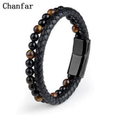 Sleek black braided leather and tiger eye bead bracelet with bold magnetic clasp, exuding unique style