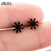 Unique black starburst stud earrings with bold geometric design, perfect for standout style