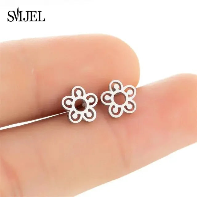Delicate silver flower stud earrings, perfect for expressing unique, playful style