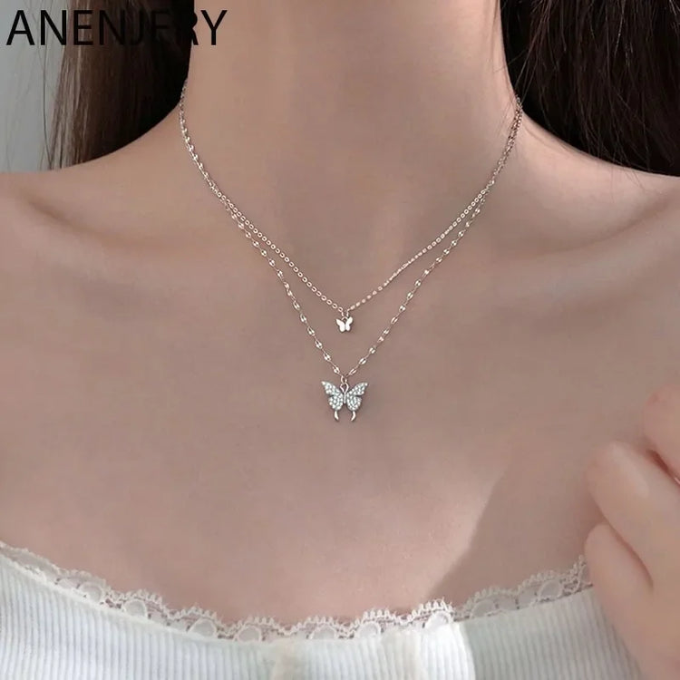 Layered silver butterfly pendant necklace, sparkling, elegant, perfect for unique style