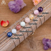 Curiously unique gemstone bead necklaces with amethyst, kunzite, aquamarine and more, inviting discovery.
