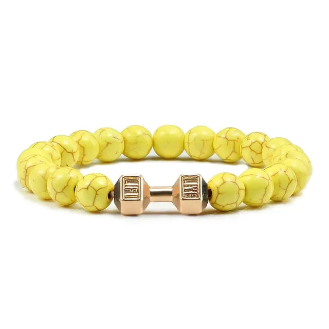 Vibrant yellow beaded bracelet with gold dumbbell charm, perfect for unique jewelry lovers