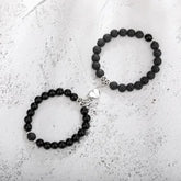 Unique black beaded bracelet set with heart charm, stylish gift for a bold, modern look