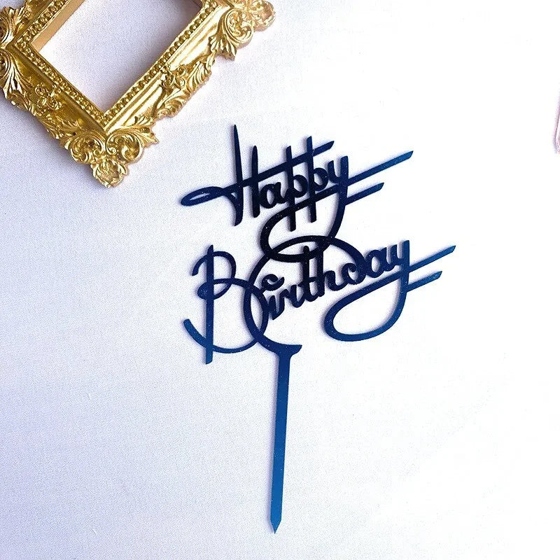 Elegant blue acrylic Happy Birthday cake topper with a creative script beside a gold ornate frame